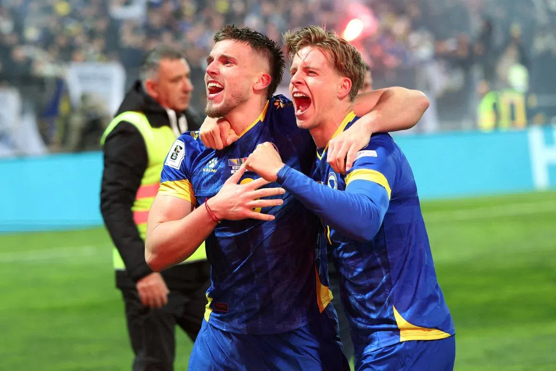 FILE PHOTO: Soccer Football - FIFA World Cup - UEFA Qualifiers - Finals - Bosnia and Herzegovina v Italy - Bilino Polje Stadium, Zenica, Bosnia and Herzegovina - March 31, 2026 Bosnia and Herzegovina's Ermedin Demirovic and Dzenis Burnic celebrate qualifying for the FIFA World Cup REUTERS/Amel Emric/File Photo