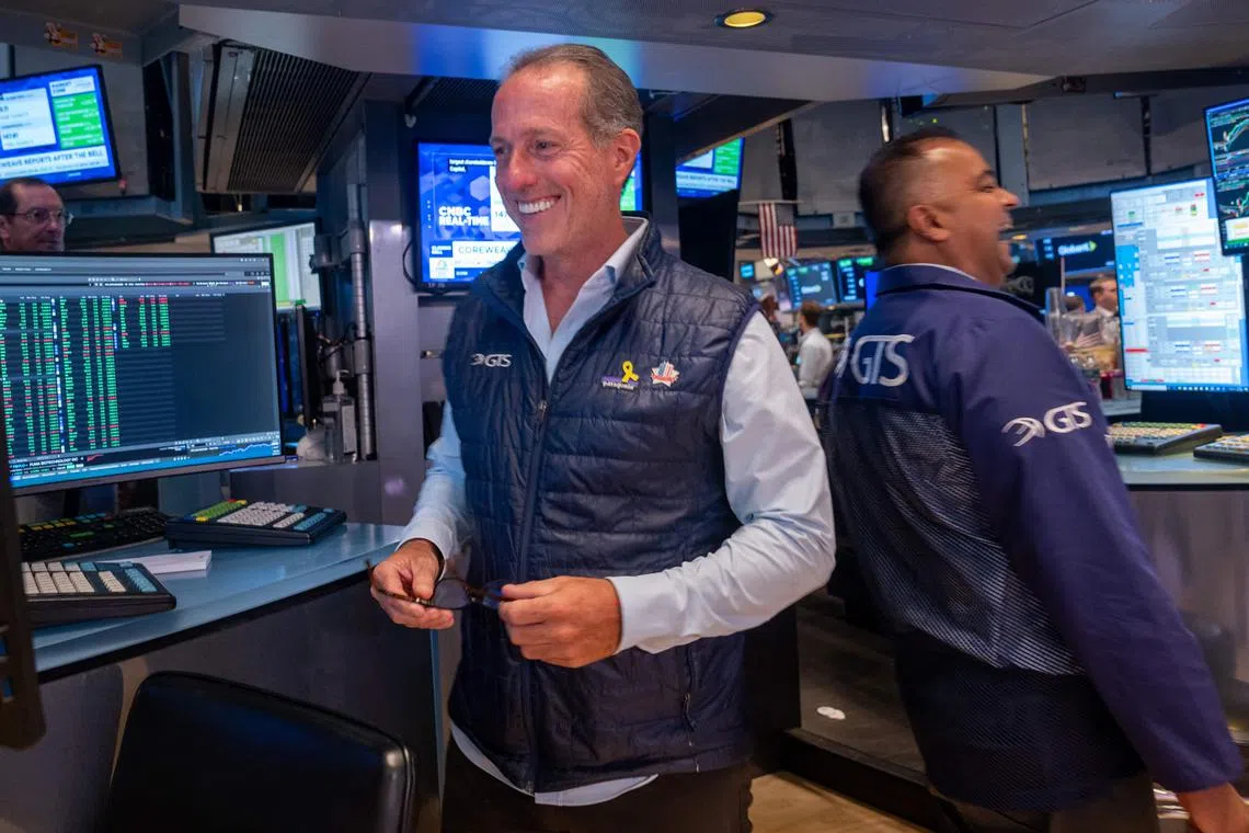 Traders working on the floor of the New York Stock Exchange on Aug 12, in New York City.