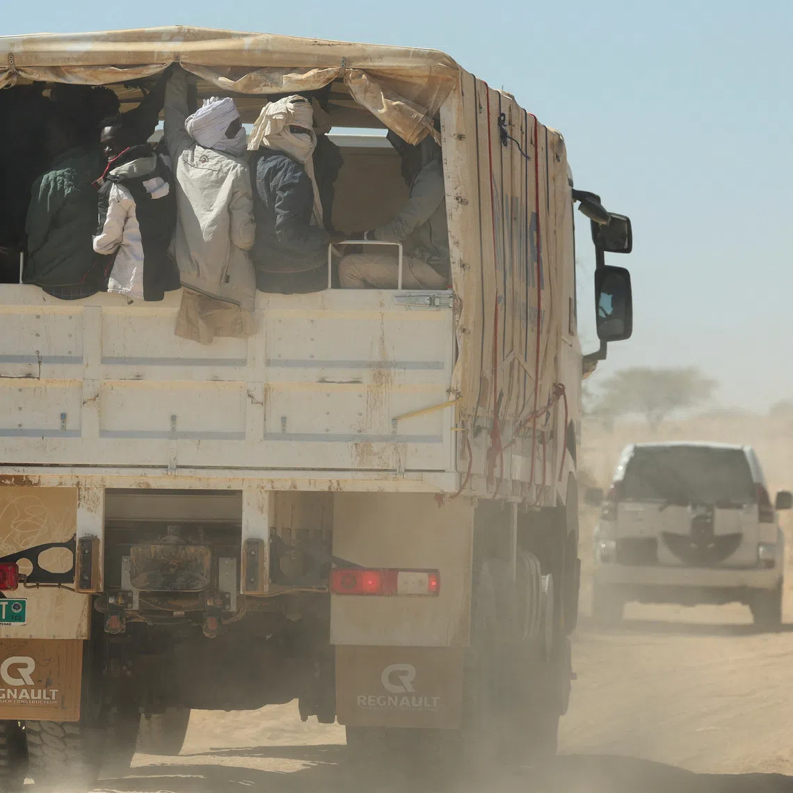FILE PHOTO: Sudanese refugees from al-Fashir are transported by UNHCR from Tine to the Tuloum refugee camp, following the conflict between the paramilitary Rapid Support Forces (RSF) and the Sudanese army, in eastern Chad, November 21, 2025. REUTERS/Amr Abdallah Dalsh/ File Photo