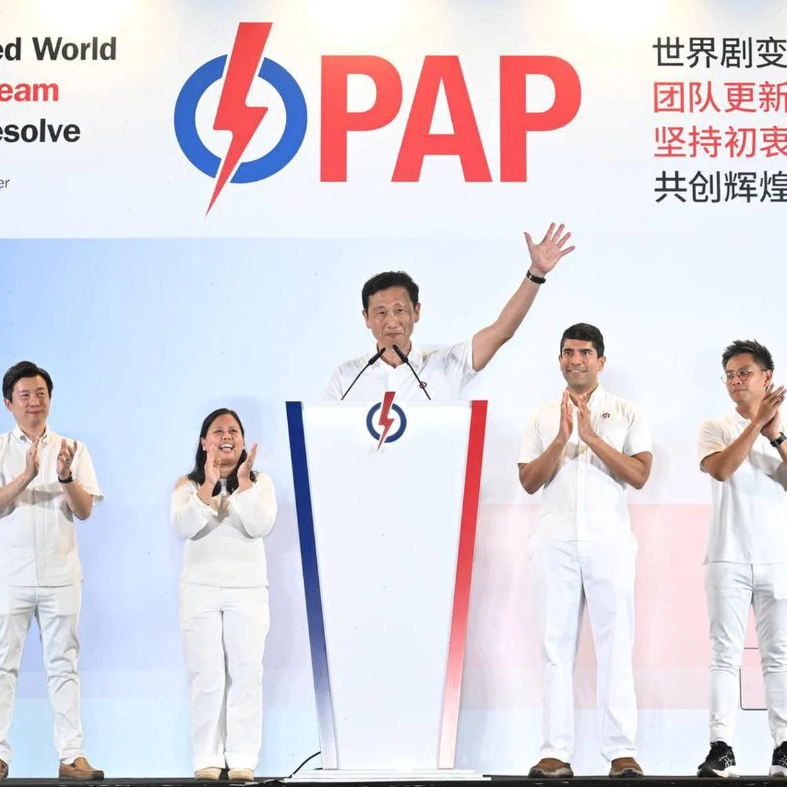 The PAP's Sembawang GRC candidates (from left) Gabriel Lam, Mariam Jaafar, Ong Ye Kung, Vikram Nair and Ng Shi Xuan at Yio Chu Kang Stadium on polling day.