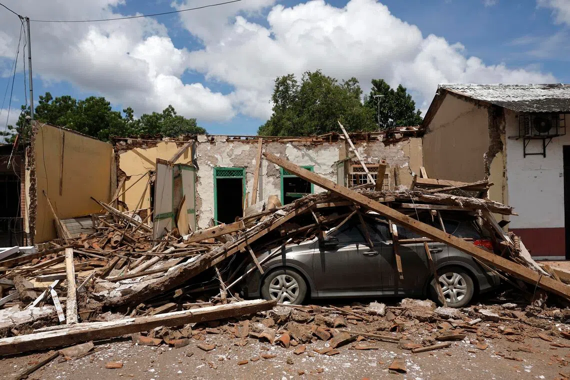 After the initial 7.7-magnitude quake around midday on Oct 9, more than 100 aftershocks have been recorded, some as strong as magnitude 6.0.