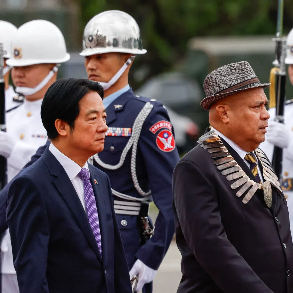 Taiwan President Lai Ching-te welcomes Tuvalu Prime Minister Feleti Teo, in front of the presidential office in Taipei, Taiwan, on Nov 18. 
