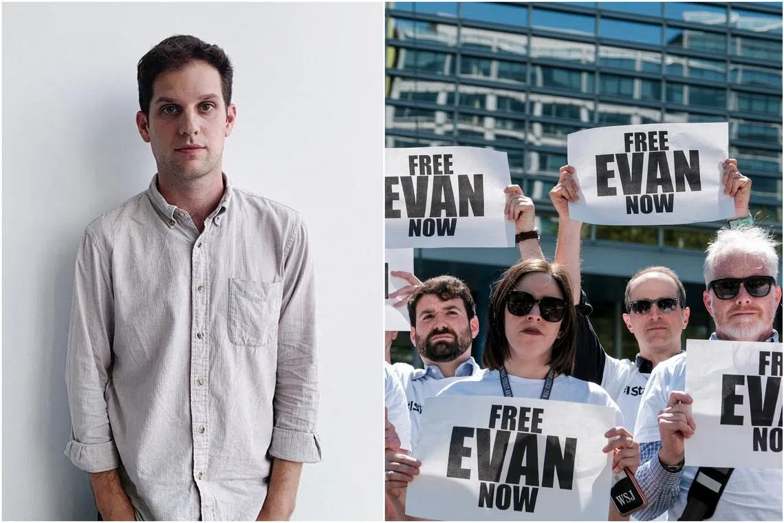 Supporters of Wall Street Journal reporter Evan Gershkovich (left) outside of the World Bank headquarters in Washington, on April 12, 2023.