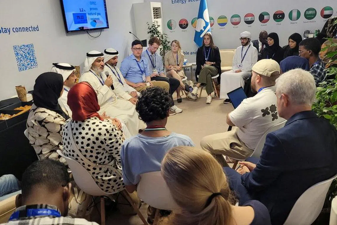 Opec's Secretary General Haitham Al Ghais talks to youth during the "Special Day – Opec and the youth" event at the United Nations Climate Change Conference (COP28) in Dubai, United Arab Emirates, December 10, 2023. REUTERS/Valerie Volcovici
