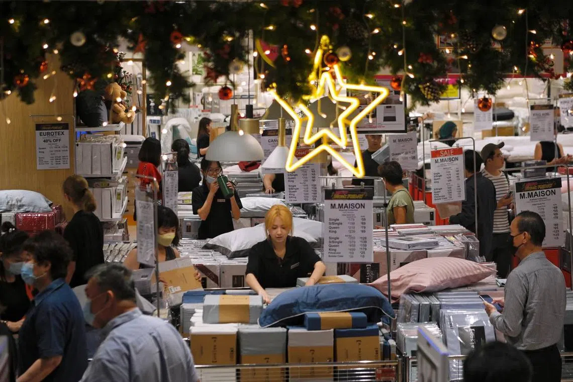 Shoppers at Metro Paragon during Black Friday sales on Nov 25, 2022.