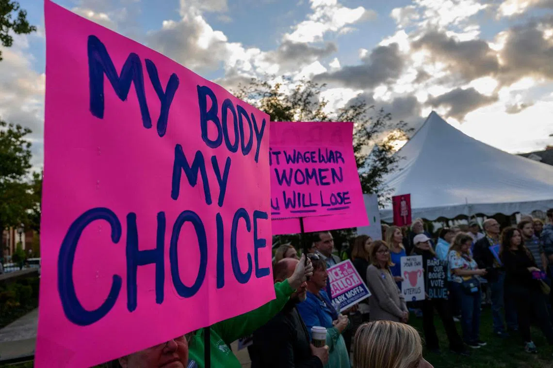 Activists protest during a "Bans Off Our Bodies" rally in support of abortion rights at Old Bucks County Courthouse in Doylestown, Pennsylvania on September 29, 2022. - In Pennsylvania, the northeastern US state where a tight battle for a Senate seat is shaping up that could give Republicans a majority in the Senate, Democrats have clearly identified the stakes and their campaign sometimes takes on the appearance of a referendum to save abortion rights. (Photo by ANGELA WEISS / AFP)