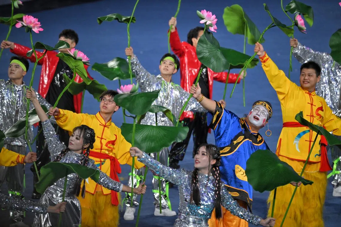 Performers are seen during a pre-parade segment of the opening ceremony of the 19th Asian Games held at the Hangzhou Olympic Sports Center Stadium on Sept 23.