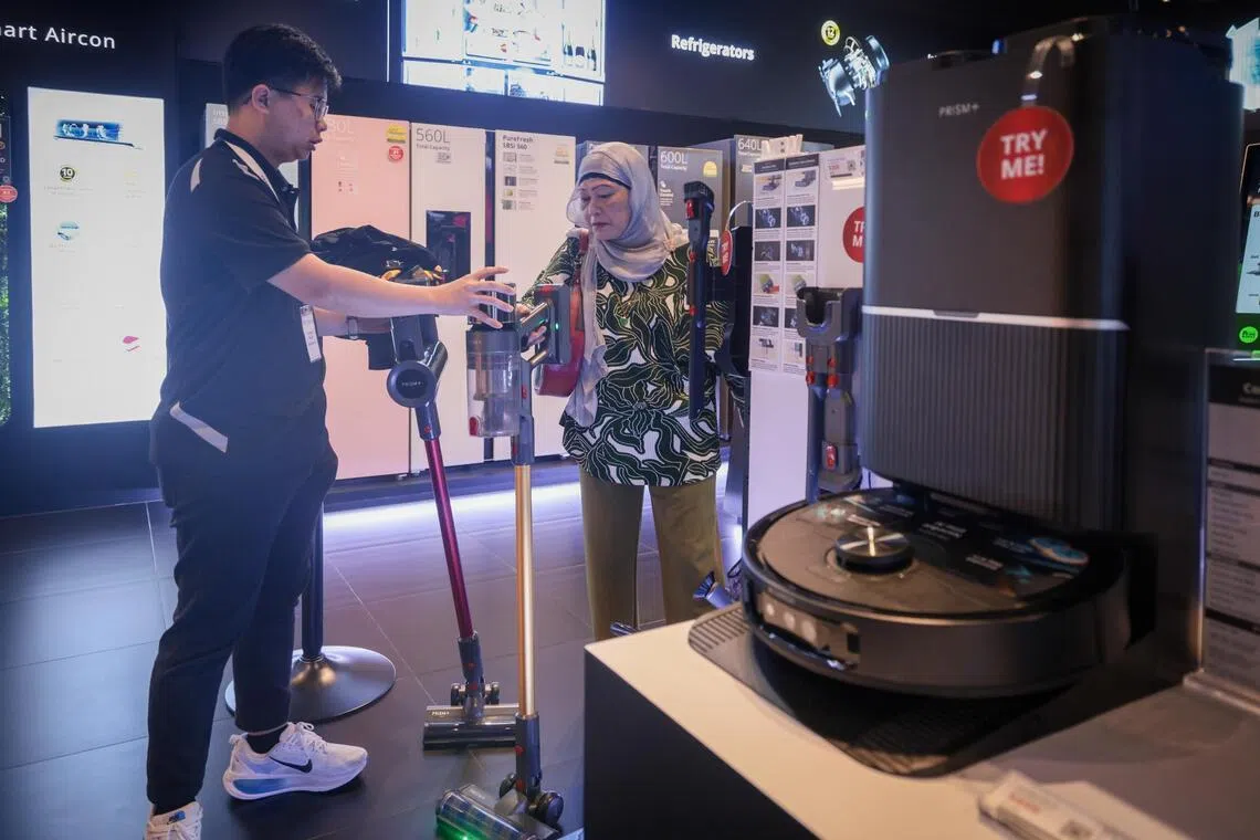 Customers at Prism+’s relaunched Suntec City store on June 19, 2026.