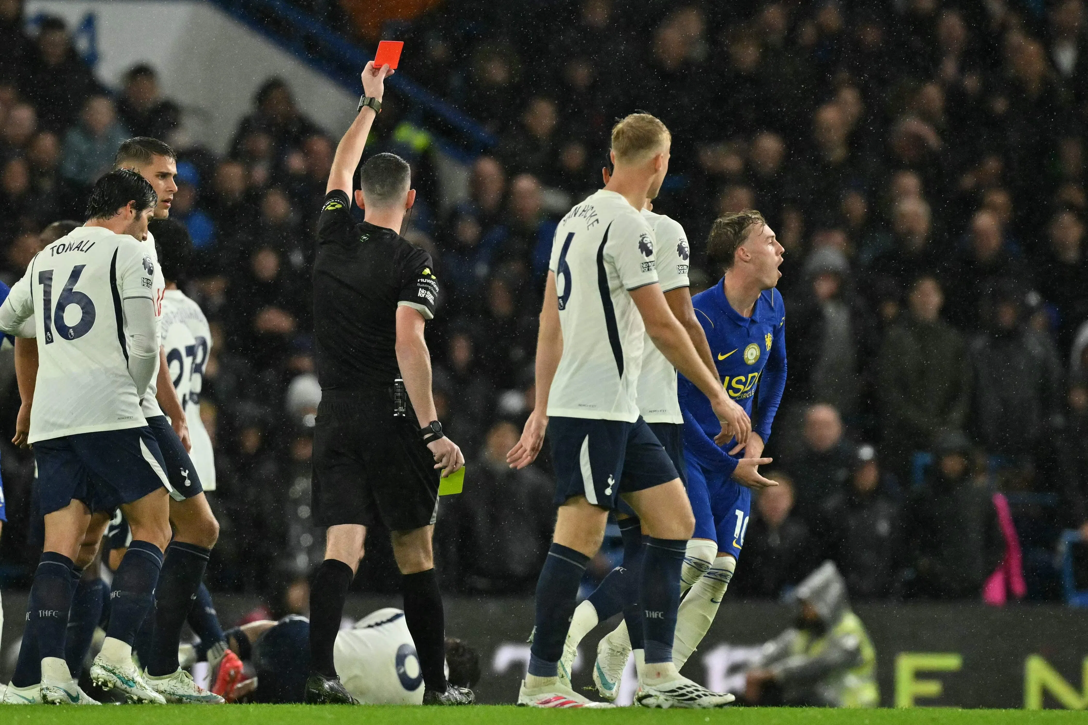 Chelsea’s Cole Palmer (right) is sent of by referee Chris Kavanagh.
