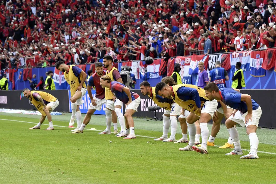 Soccer Football - Euro 2024 - Group B - Croatia v Albania - Hamburg Volksparkstadion, Hamburg, Germany - June 19, 2024 Croatia players during the warm up before the match REUTERS/Fabian Bimmer