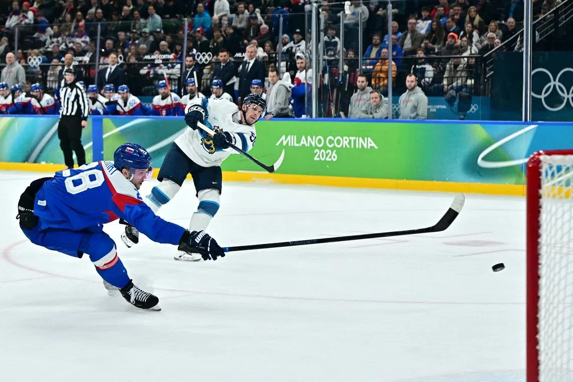 Milano Cortina 2026 Olympics - Ice Hockey - Men's Bronze Medal Game - Slovakia vs Finland - Milano Santagiulia Ice Hockey Arena, Milan, Italy - February 21, 2026. Erik Haula of Finland scores their sixth goal. REUTERS/Marton Monus