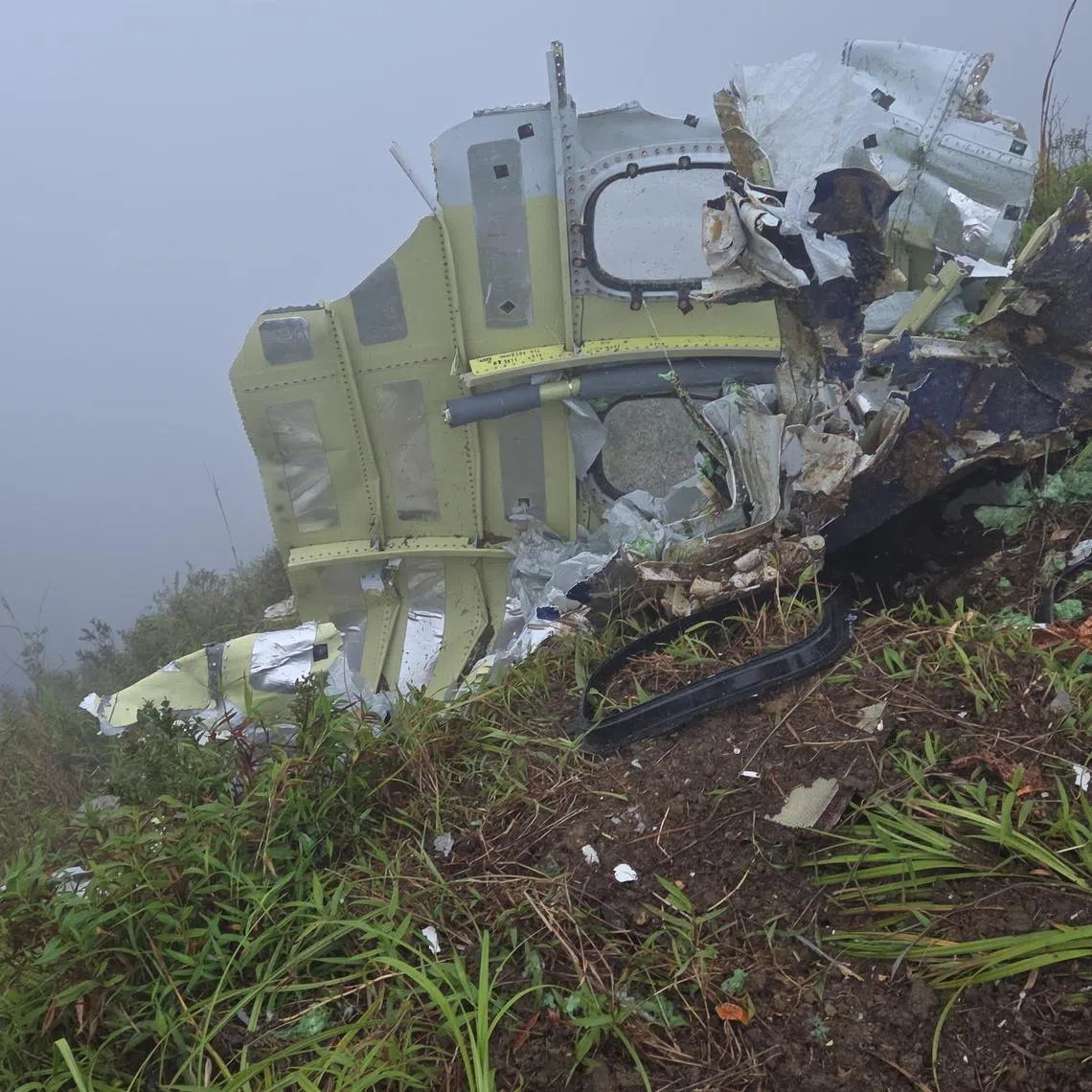 A handout photo made available by the Indonesian National Search and Rescue Agency shows the wreckage of an aircraft found during a search-and-rescue operation in Maros on Jan 18.