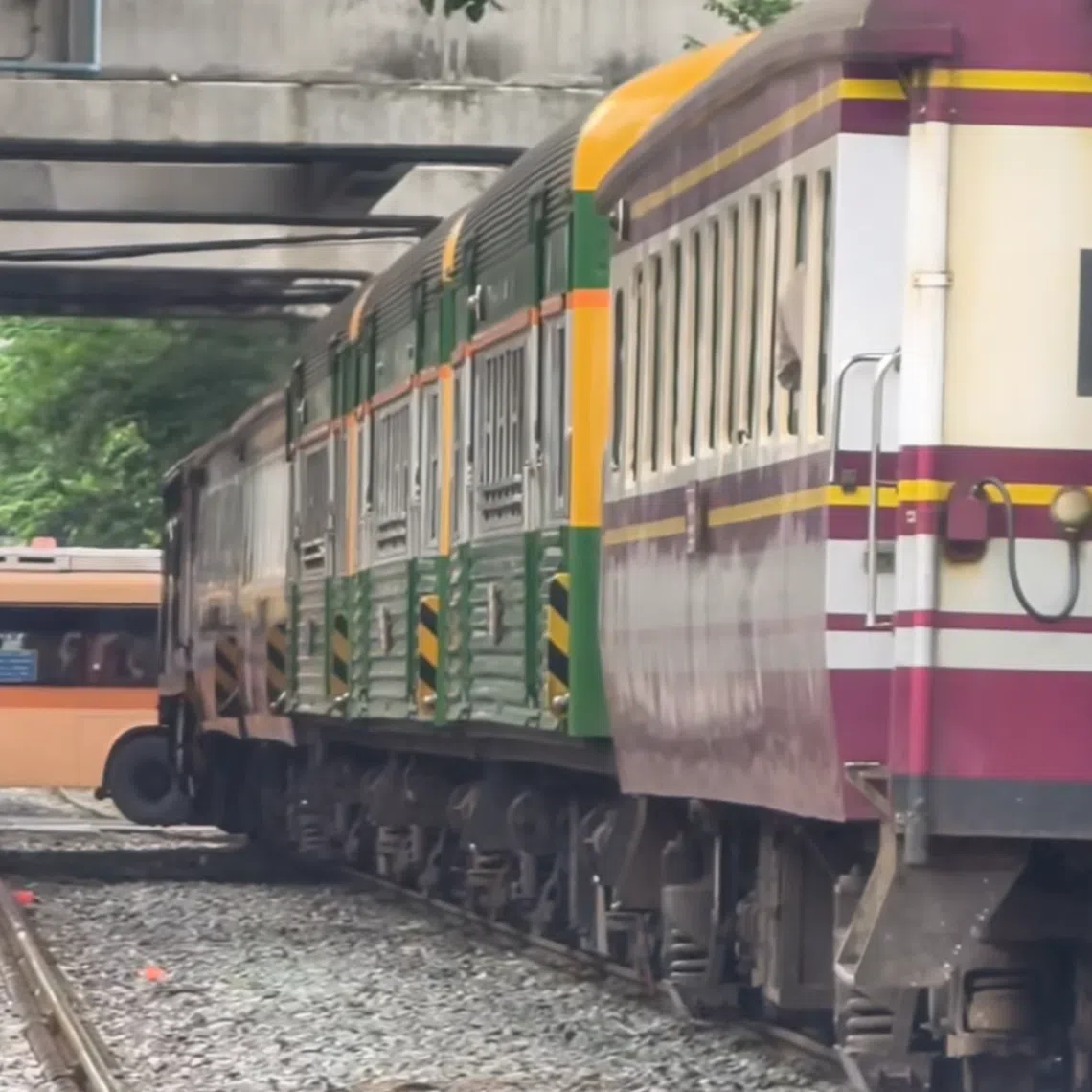 Traffic came to an abrupt halt as the bus was crossing the railway line, leaving it stranded over the tracks.