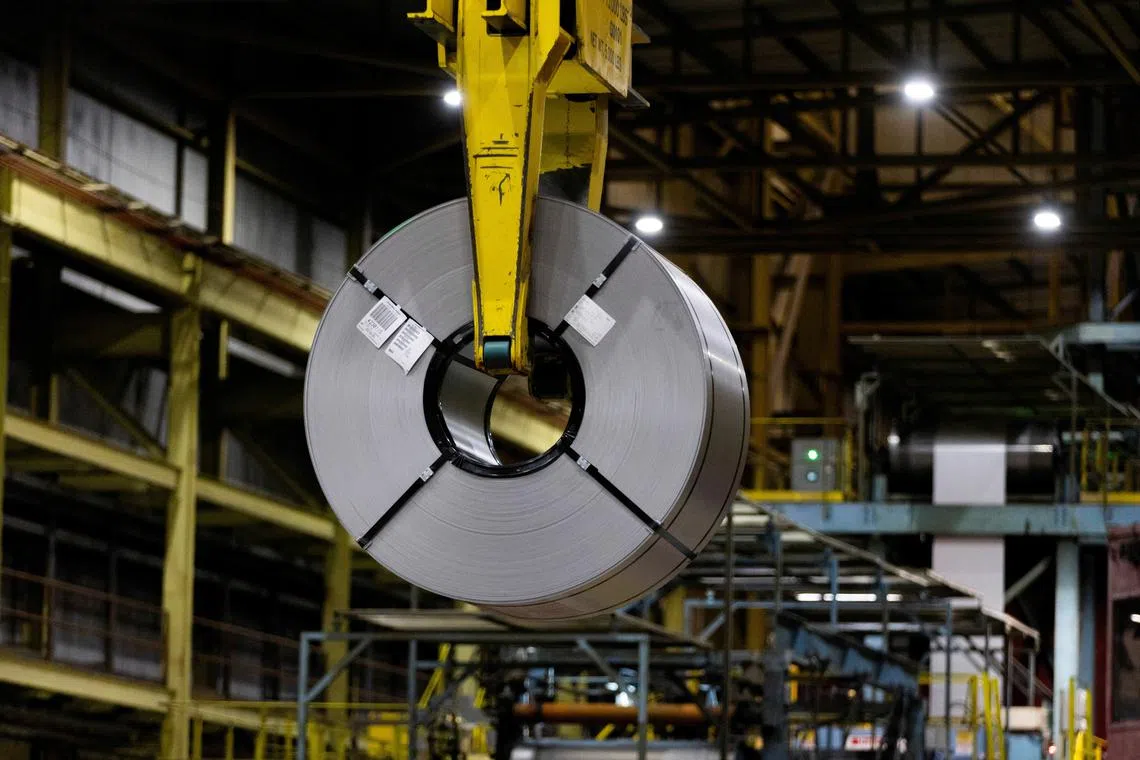 FILE PHOTO: A steel coil is moved at a steel mill in Hamilton, Ontario, Canada, March 12, 2025.  REUTERS/Carlos Osorio/File Photo