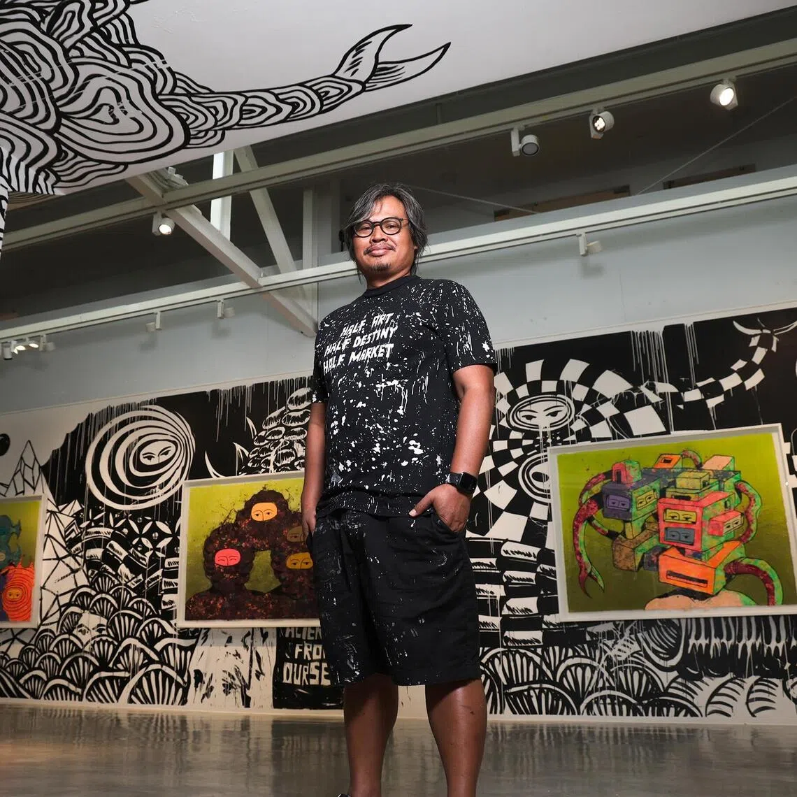 Indonesian artist Eko Nugroho at his exhibition, titled Strange Monster View, at STPI, a print and paper gallery and workshop in Robertson Quay.