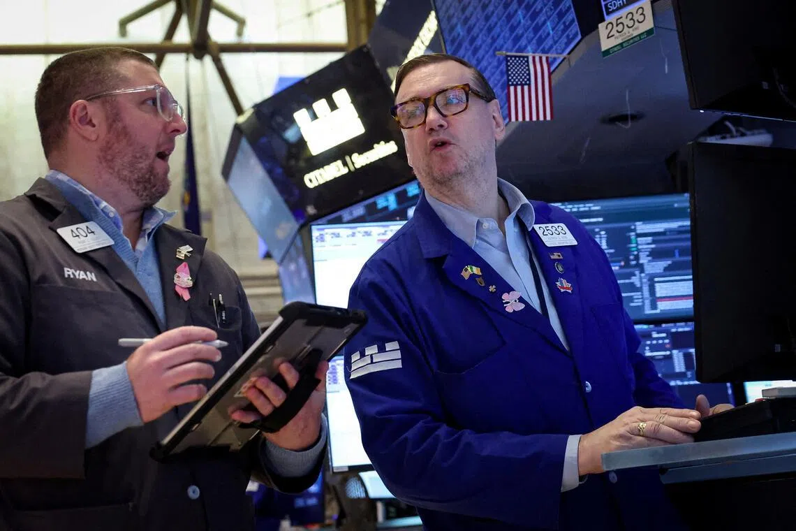 Traders working on the floor of the New York Stock Exchange, in New York City, on Feb 25.