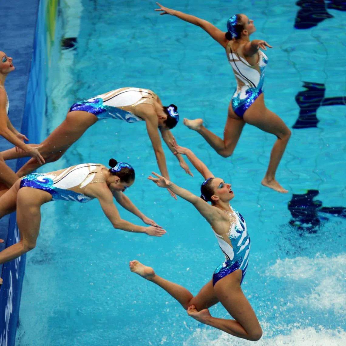 FILE PHOTO: General Sport - Beijing 2008 Olympic Games - Beijing, China - 23/8/08 
Synchronised Swimming - Russia leap into the water to begin their routine 
Mandatory Credit: Action Images / Jason O'Brien 
Livepic /File Photo