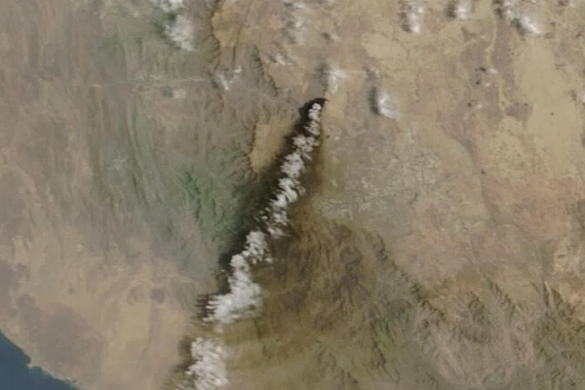 A satellite image shows smoke rising from the Saudi Aramco distribution centre, after what the Saudi-led coalition in Yemen said were attacks by Yemen's Iran-aligned Houthis, in Abha Bulk, Saudi Arabia, in this handout image obtained by Reuters on September 8, 2026. NASA WORLDVIEW/Handout via REUTERS    THIS IMAGE HAS BEEN SUPPLIED BY A THIRD PARTY. MANDATORY CREDIT. BEST QUALITY AVAILABLE.