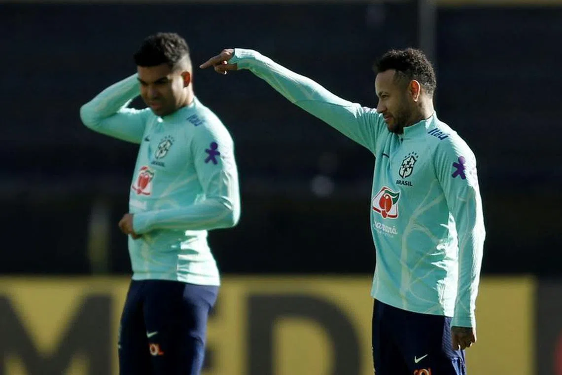 Soccer Football - World Cup - South American Qualifiers - Brazil training - Estadio Campeon del Siglo, Montevideo, Uruguay - October 15, 2023 Brazil's Neymar and Casemiro during training REUTERS/Andres Cuenca