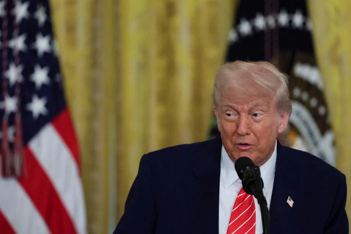 U.S. President Donald Trump speaks during a celebration of U.S. military mothers in the East Room at the White House in Washington, D.C., U.S., May 8, 2025. REUTERS/Leah Millis