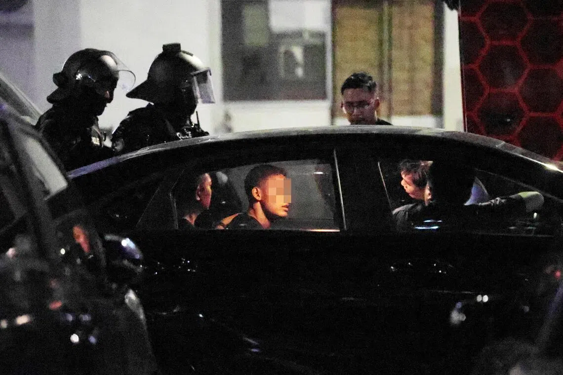 Two men and a woman refused to open the door and locked themselves inside a residential unit at Block 262 Jurong East Street 24.