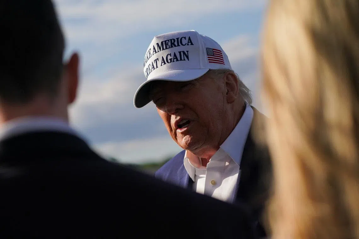 FILE PHOTO: U.S. President Donald Trump speaks to the media before boarding Air Force One as he departs for Washington, D.C., at Morristown Municipal Airport in Morristown, New Jersey, U.S., May 25, 2025. REUTERS/Nathan Howard/File Photo