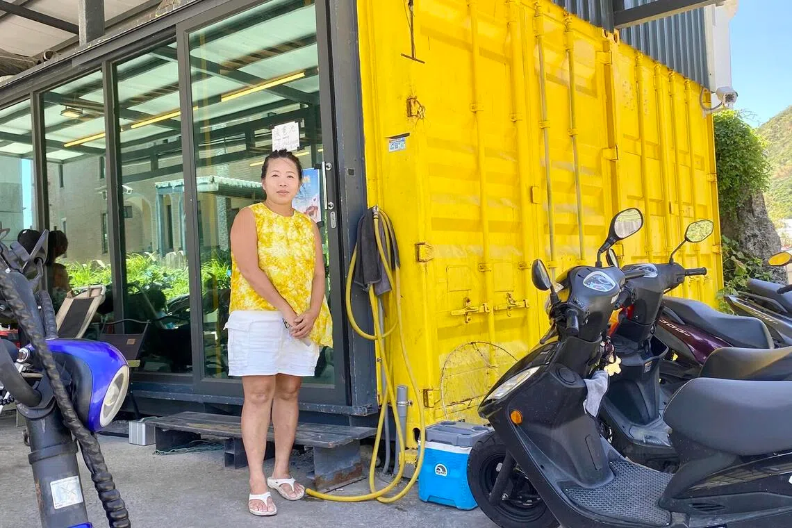 Wu Shu-feng, who rents out scooters and bicycles to tourists on Green Island, says she is “numb” to news about Chinese military harassment towards Taiwan.