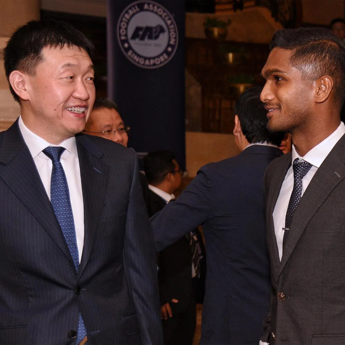 New Football Association (FAS) of Singapore president Forrest Li (left) chatting with vice-president and national football captain Hariss Harun after the extraordinary congress on April 28 at the Raffles Town Club.