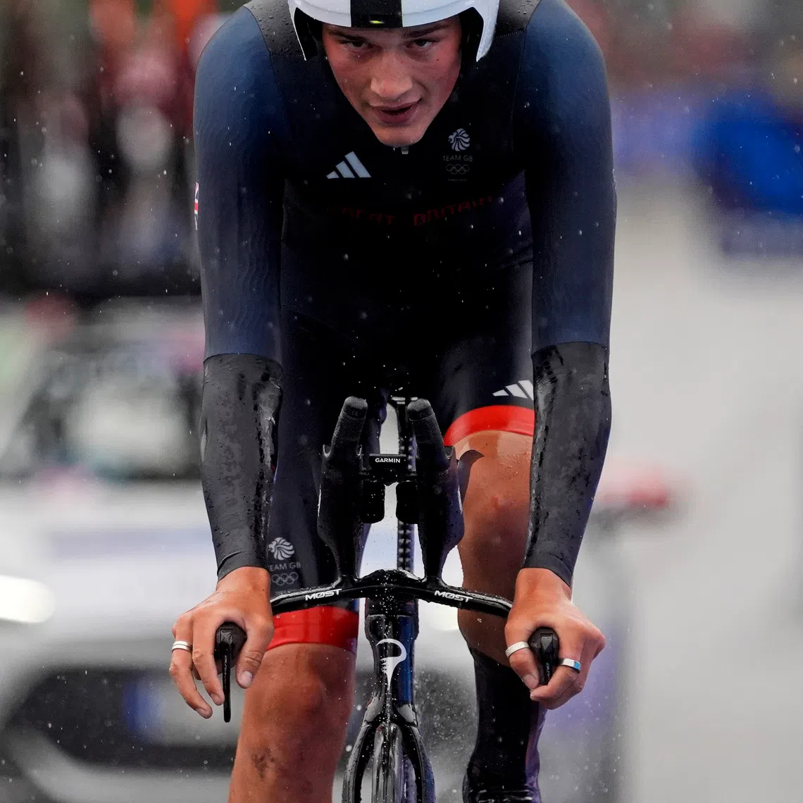 Jul 27, 2024; Paris, France; Josh Tarling (GBR) in the men’s individual time trial road cycling during the Paris 2024 Olympic Summer Games at Grand Palais-Pont Alexandre III. Mandatory Credit: Andrew P. Scott-USA TODAY Sports