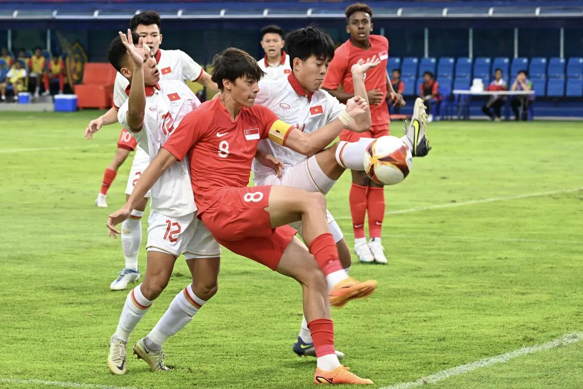 Singapore captain Harhys Stewart challenging for the ball inside the opposition’s penalty box during the first half of the Group B match between Singapore and Vietnam, 3 May 2023. [32nd Cambodia SEA Games 2023]