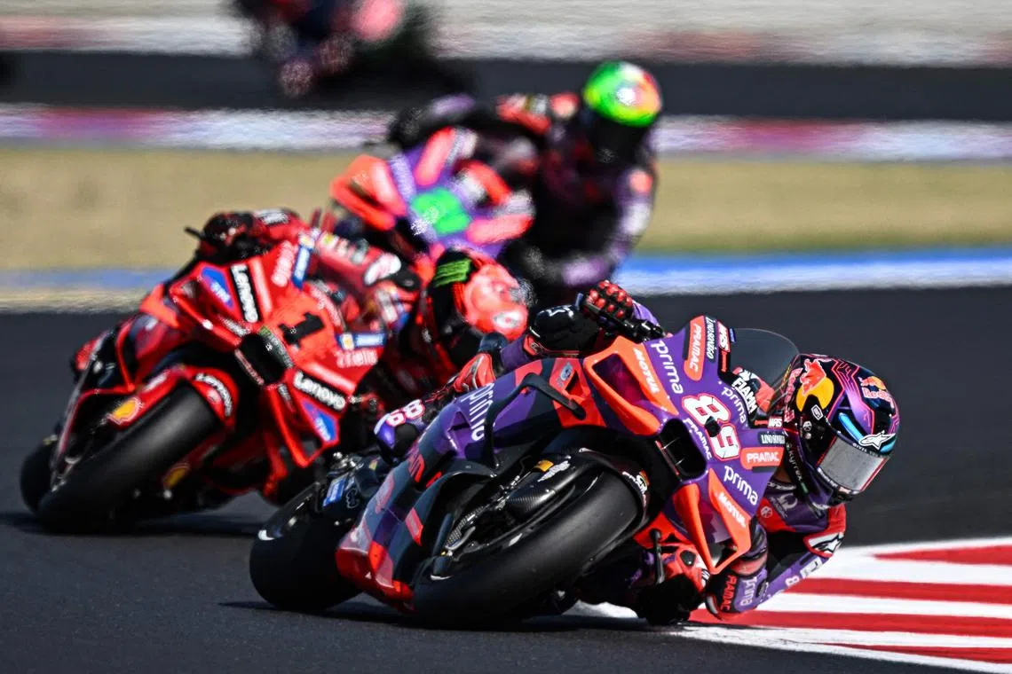 Spanish rider Jorge Martin leads the pack ahead of Italians Francesco Bagnaia and Franco Morbidelli in the sprint race of the San Marino MotoGP Grand Prix at the Misano World Circuit Marco-Simoncelli on Sept 7, 2024.