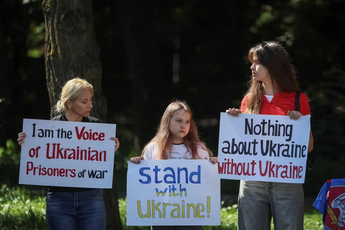 Ukrainians taking part in a rally in front of the US embassy in Kyiv, Ukraine, ahead of the Aug 15 summit between US President Donald Trump and Russian President Vladimir Putin in Alaska.