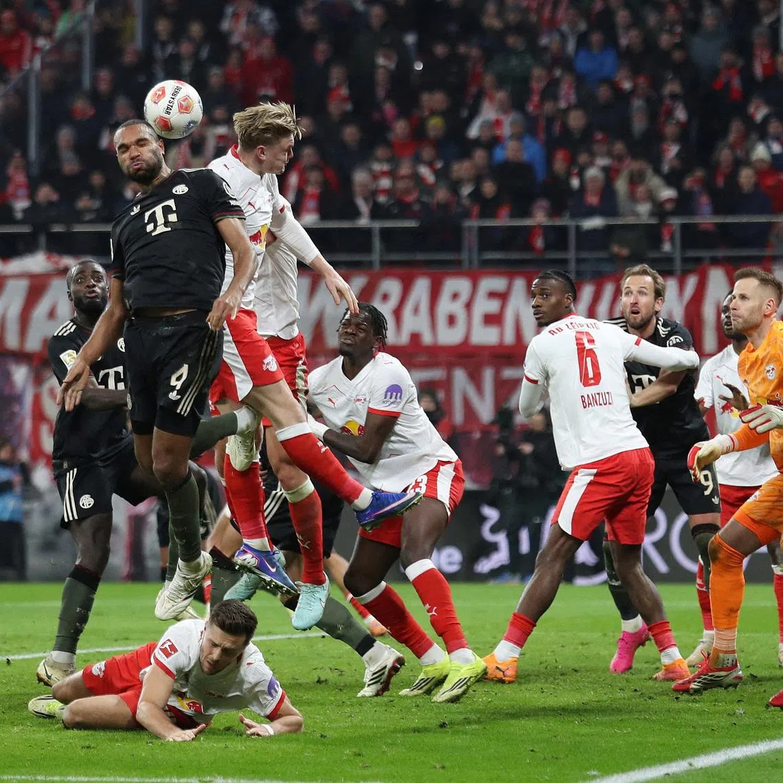 Soccer Football - Bundesliga - RB Leipzig v Bayern Munich - Red Bull Arena, Leipzig, Germany - January 17, 2026 Bayern Munich's Jonathan Tah scores their third goal REUTERS/Maryam Majd