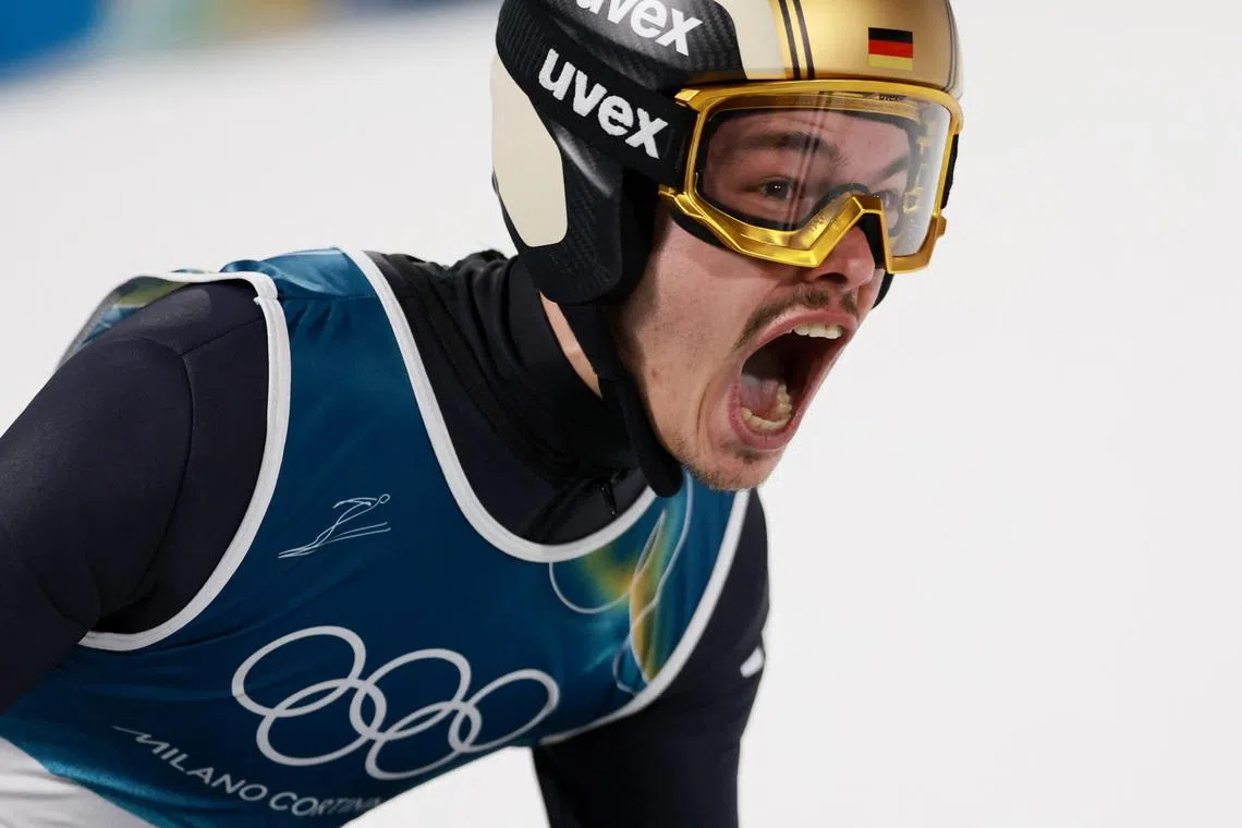 Milano Cortina 2026 Olympics - Ski Jumping - Men's Normal Hill Individual - Final Round - Predazzo Ski Jumping Stadium, Predazzo, Italy - February 09, 2026. Philipp Raimund of Germany reacts after performing. REUTERS/Stephanie Lecocq