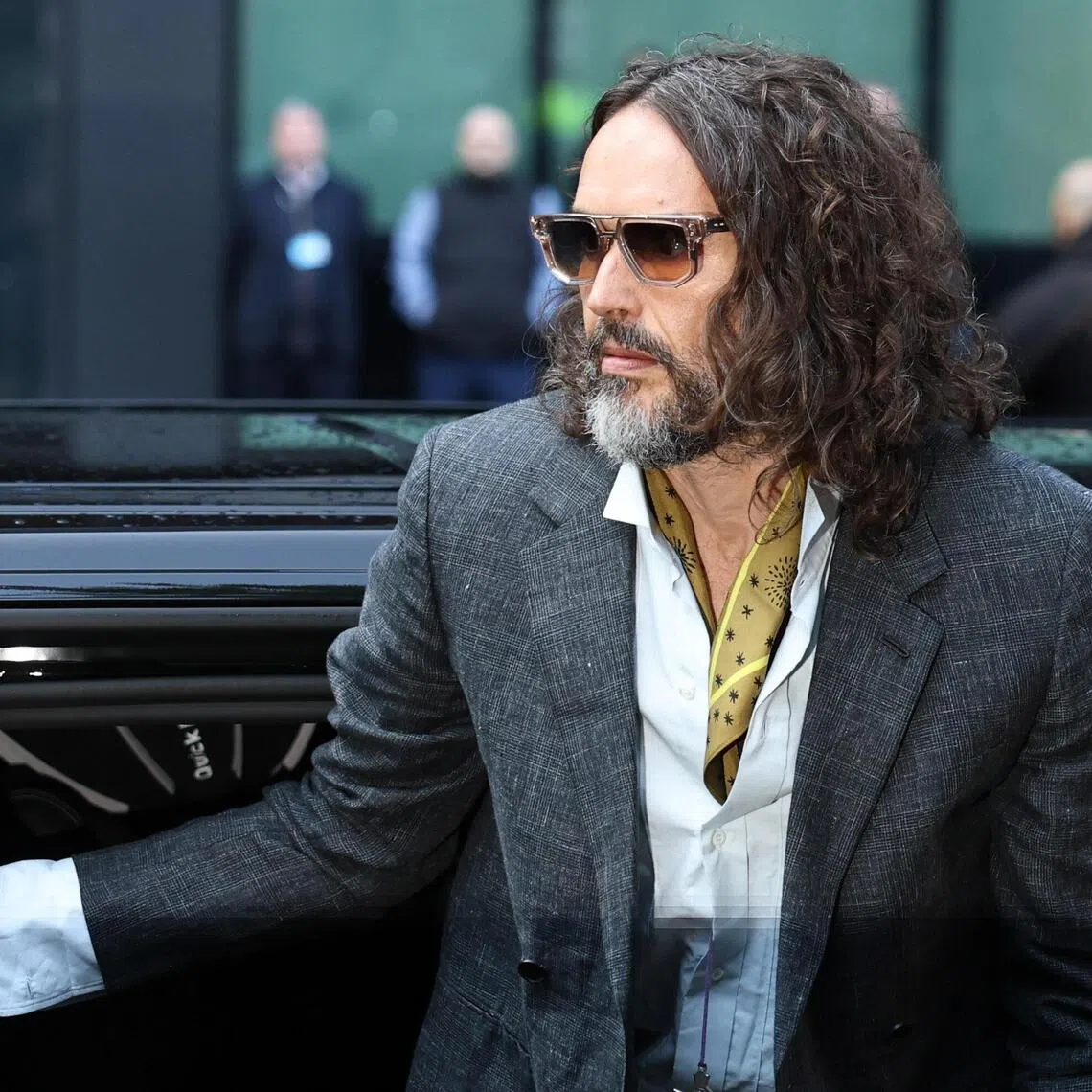 epa13315051 British comedian and actor Russell Brand arrives at Southwark Crown Court in London, Britain, 19 October 2026. Brand, whose trial began in October 2026, faces multiple counts of rape, sexual assault, and indecent assault.  EPA/NEIL HALL