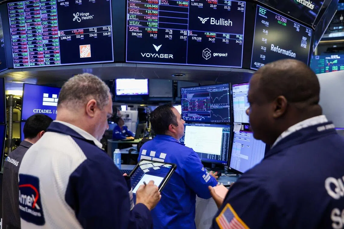 Traders working on the floor of the New York Stock Exchange, in New York City, on July 31.