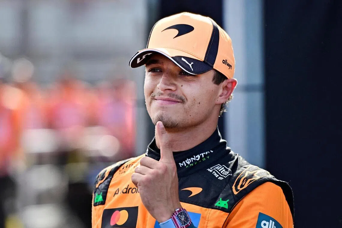 McLaren’s Lando Norris celebrates after qualifying in pole position  for the Hungarian Grand Prix.