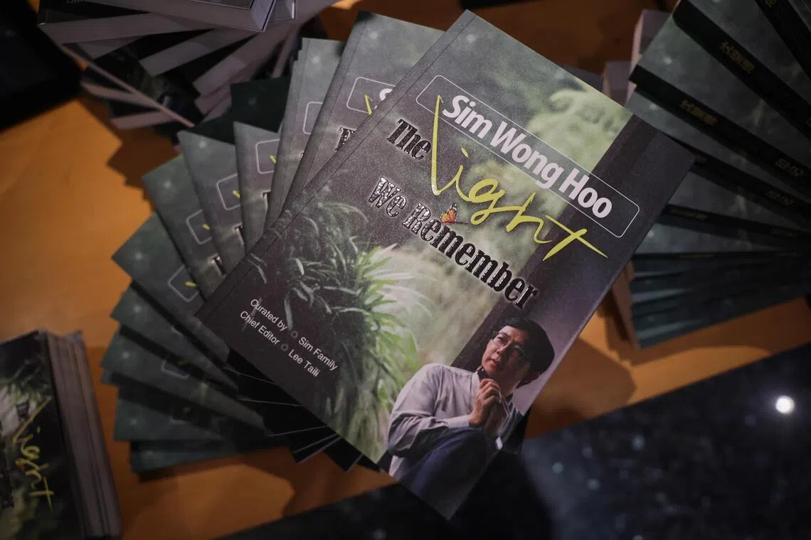 Copies of the book Sim Wong Hoo: The Light We Remember during the launch at Woodlands Library auditorium on June 7.
