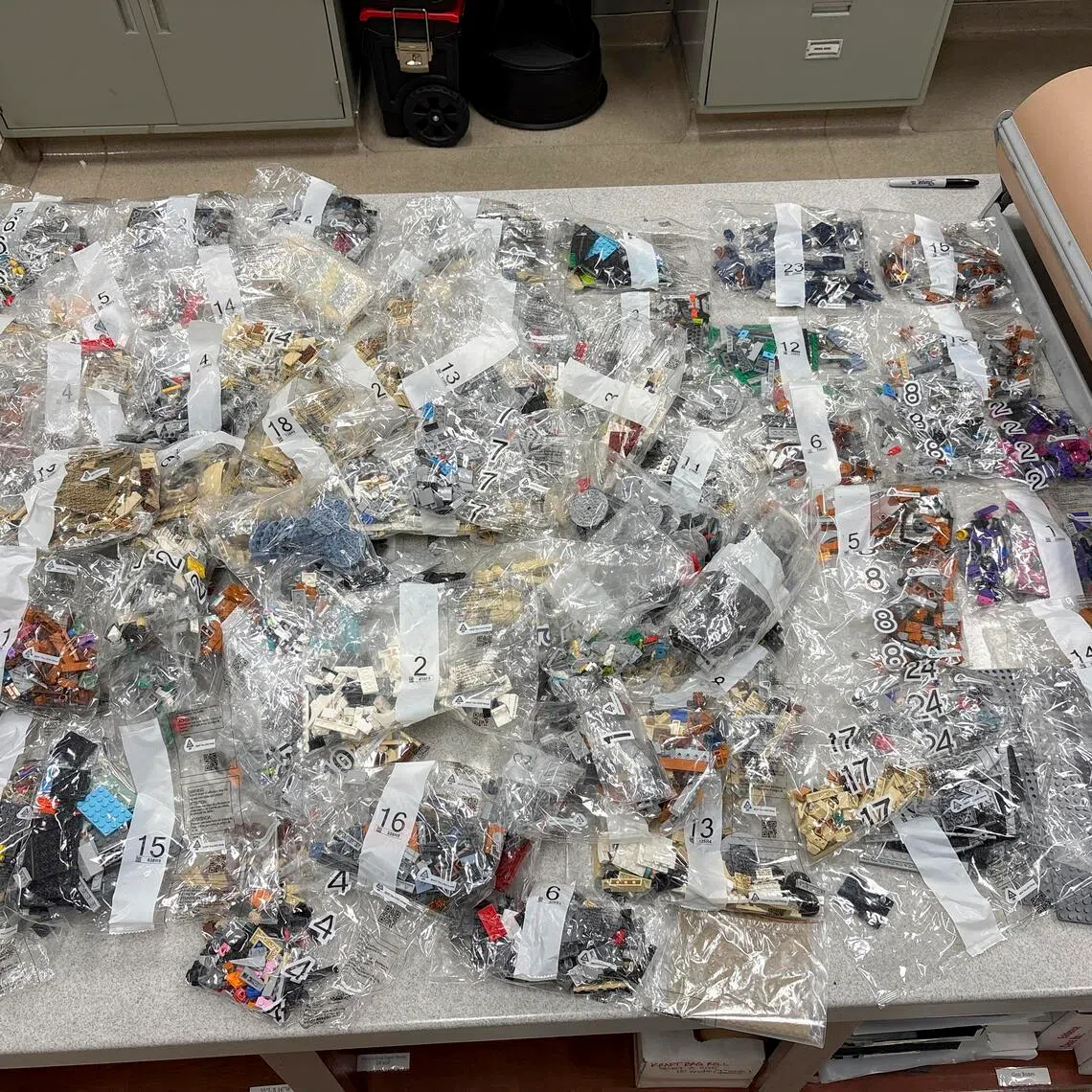 The man replaced a Marvel Avengers tower building set with several bags of Goya brand elbow-shaped pasta.