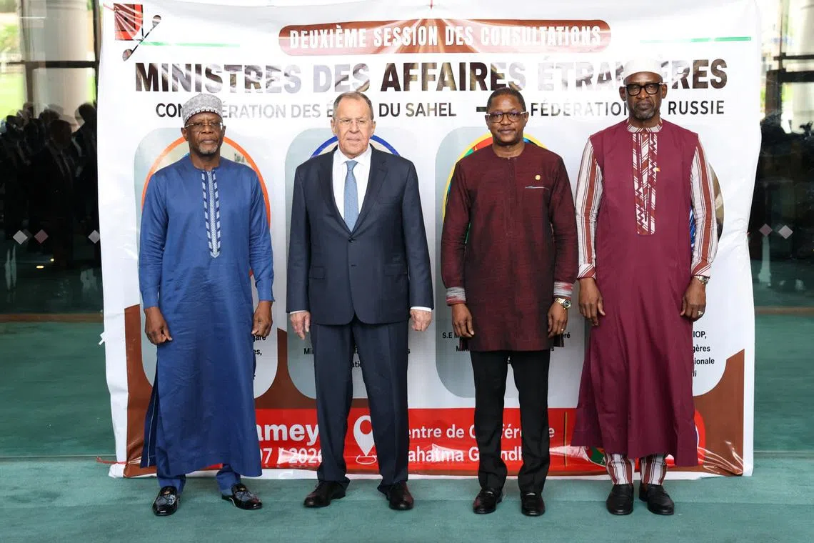 Russia’s Foreign Minister Sergei Lavrov pose with Niger Foreign Minister Bakary Yaou Sangare, Burkina Faso Foreign Minister Karamoko Jean Marie Traore and Mali's Foreign Minister Abdoulaye Diop during a meeting with the Alliance of Sahel States (AES) ministers in Niamey, Niger July 8, 2026. Russian Foreign Ministry/Handout via REUTERS