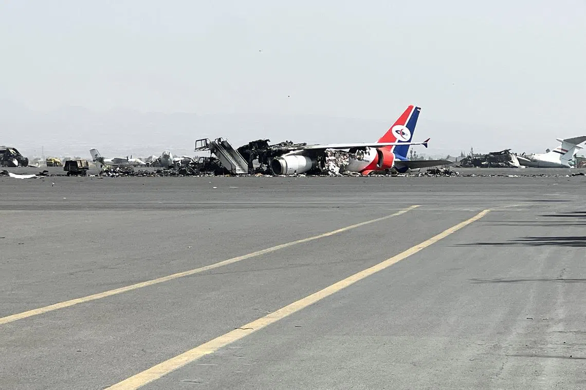 Debris of a destroyed plane lies at Sanaa International Airport, in the aftermath of an Israeli airstrike, in Sanaa, Yemen, May 29, 2025.REUTERS/Adel Al Khader.
