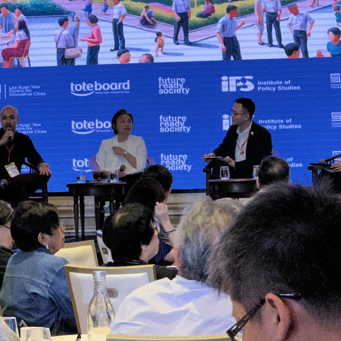 EM Services (Town Council) general manager Wee Keng Boon (far left) speaking at a panel discussion alongside Ms Karen Lee, director (partnership lab) at National Youth Council, and Mr Vincent Ng, founding member of A Good Space. Dr Suhaila Zainal Shah, a research fellow at the Lee Kuan Yew Centre for Innovative Cities (far right) was moderating the discussion.