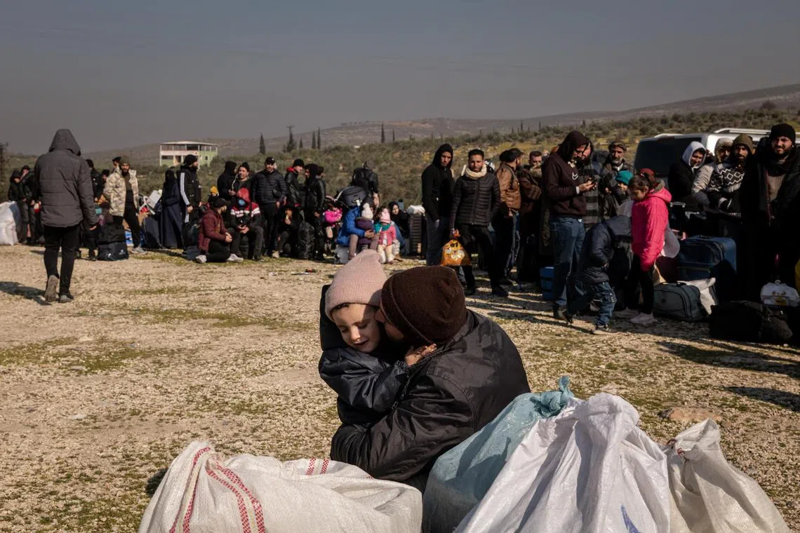 Syrians waited to cross back into Syria from Turkey, where many of them lost homes in the earthquake, at the Cilvegozu border crossing on Wednesday, Feb, 15, 2023. Thousands of Syrian refugees in Turkey lined up at border crossings on Wednesday in hopes of returning home temporarily after Syrian border officials announced that Turkey had agreed to let the refugees leave and return later while it copes with a disastrous earthquake. (Nicole Tung/The New York Times)
