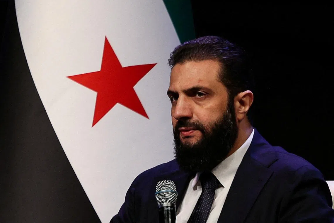 FILE PHOTO: Syrian President Ahmed al-Sharaa attends the Ministry of Awqaf conference titled \"Unity of Islamic Discourse\" at the Conference Palace in Damascus, Syria, February 16, 2026. REUTERS/Khalil Ashawi/File Photo