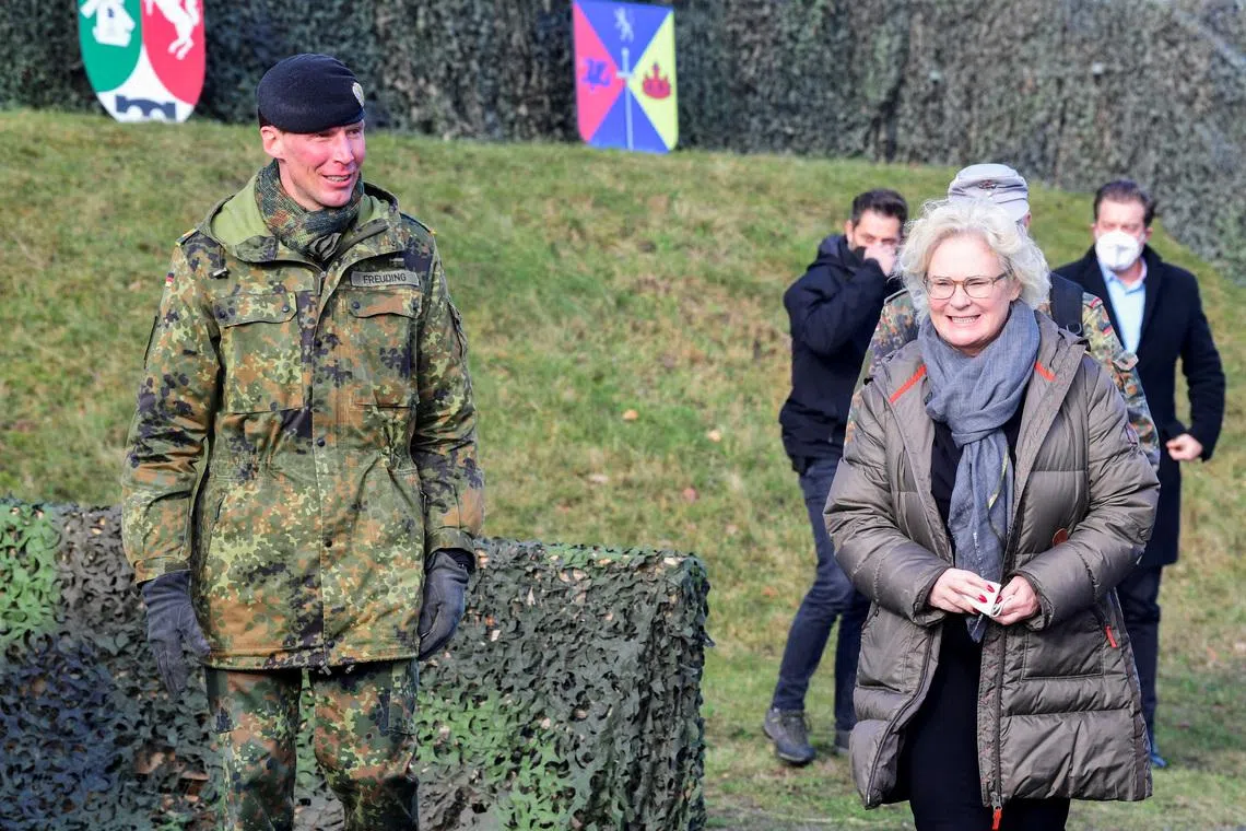 FILE PHOTO: General Christian Freuding welcomes German Defence Minister Christine Lambrecht during her visit at the Munster military base, in Munster, Germany, February 7, 2022. REUTERS/Fabian Bimmer/File Photo