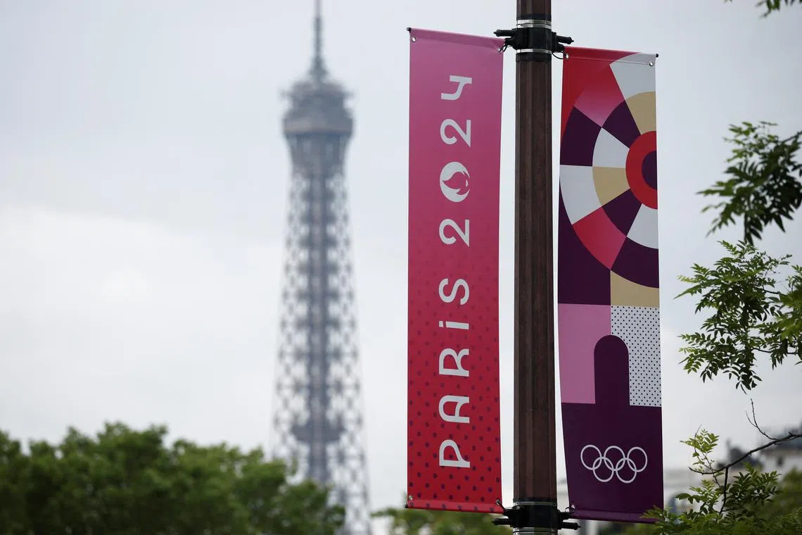 Olympic signage is displayed with the Eiffel Tower in the background ahead of the Paris 2024 Olympic games in Paris, France, June 20, 2024 REUTERS/Benoit Tessier