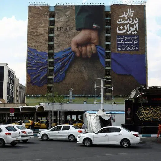 A billboard declaring the Strait of Hormuz belonging to Iran on a building in Tehran, on April 13, 2026.