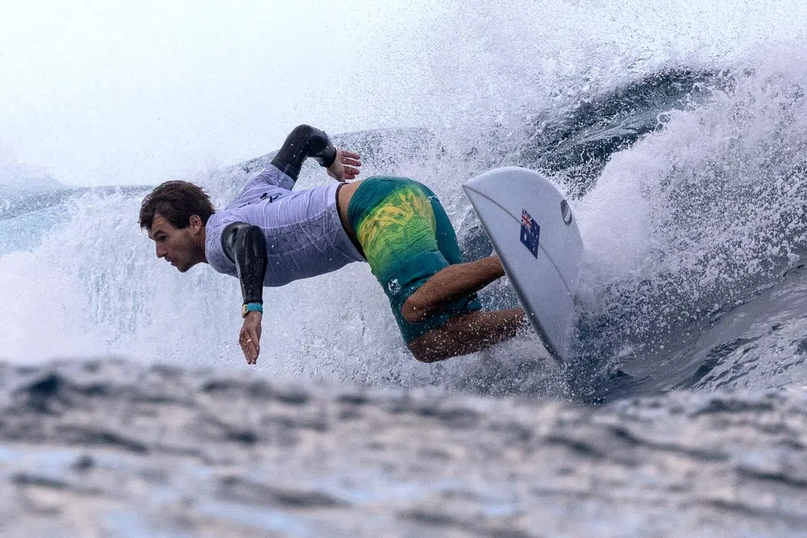 FILE PHOTO: Paris 2024 Olympics - Surfing - Training - Teahupo'o, Tahiti, French Polynesia - July 24, 2024. Jack Robinson of Australia during training REUTERS/Carlos Barria/File Photo