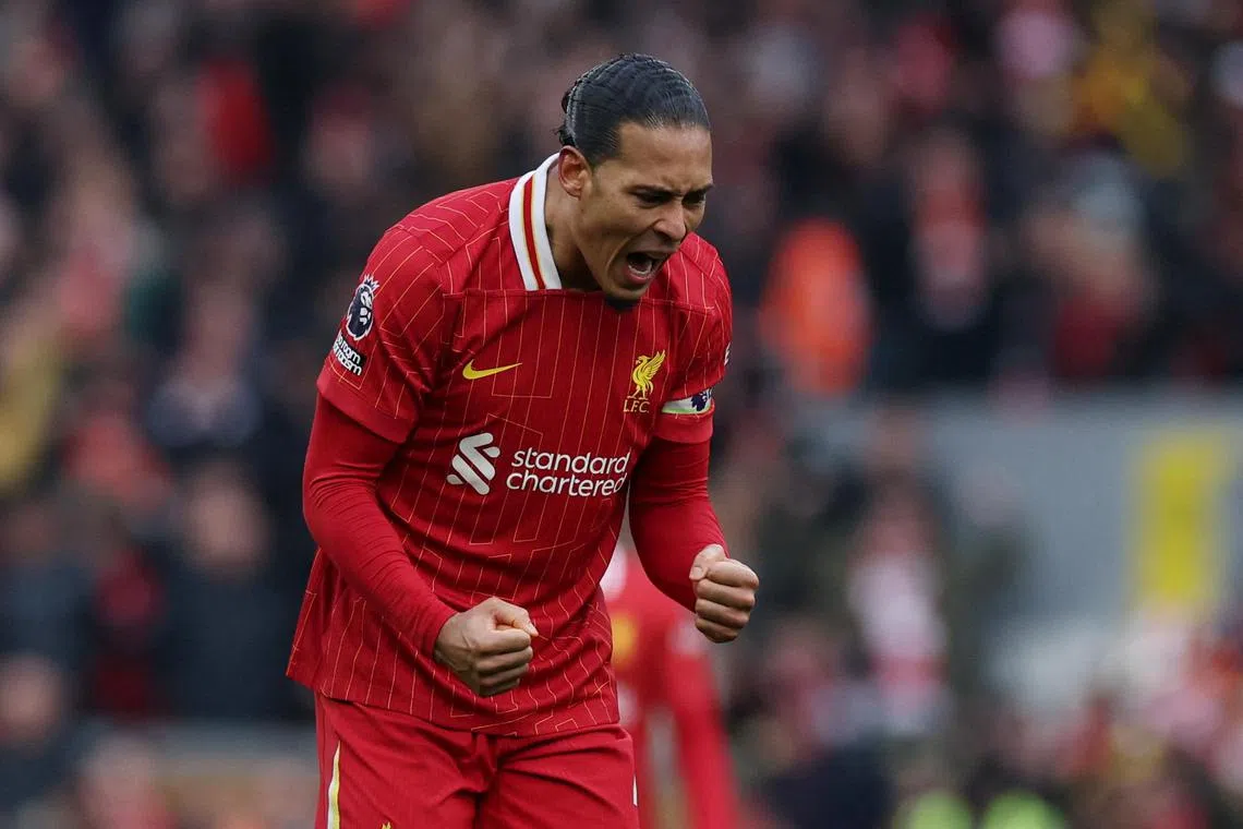 Liverpool's Virgil van Dijk celebrating after beating Wolverhampton Wanderers 2-1 at Anfield in the English Premier League on Feb 16.