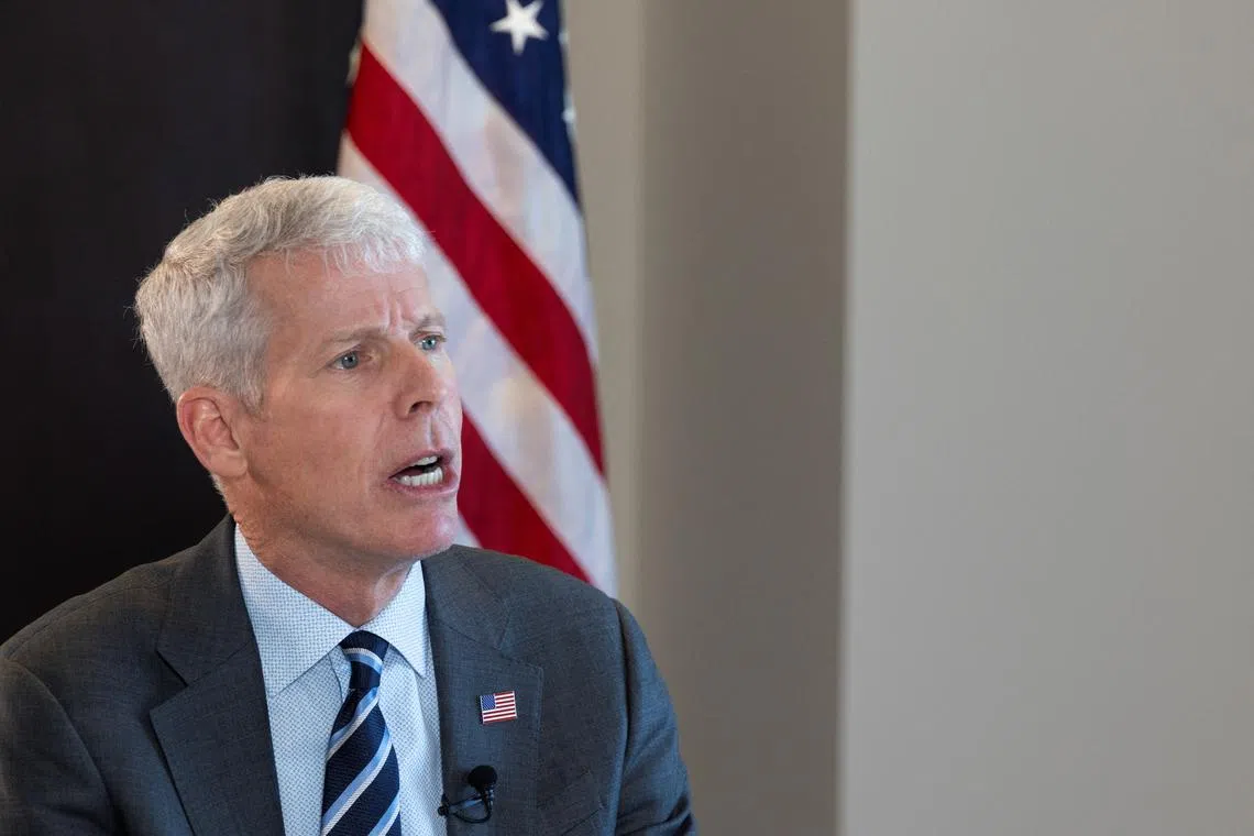 FILE PHOTO: U.S. Energy Secretary Chris Wright participates in a media interview during CERAWeek in Houston, Texas, U.S., March 10, 2025. REUTERS/Kaylee Greenlee/File Photo